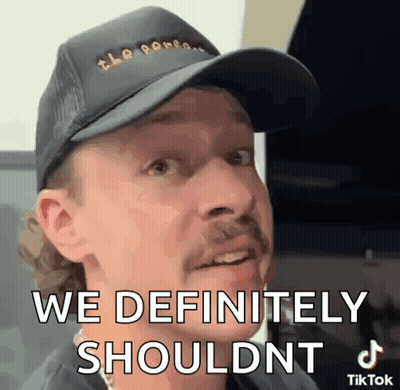 Man In Hat With Mustache Saying We Definitely Shouldn't GIF