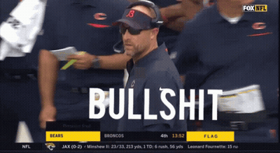 Man In Hat With Number 3 In Front Of Bullshit Screen GIF