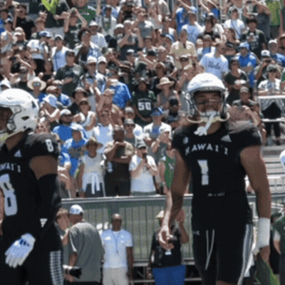 Man In Hawaii 1 Jersey In Front Of Crowd GIF