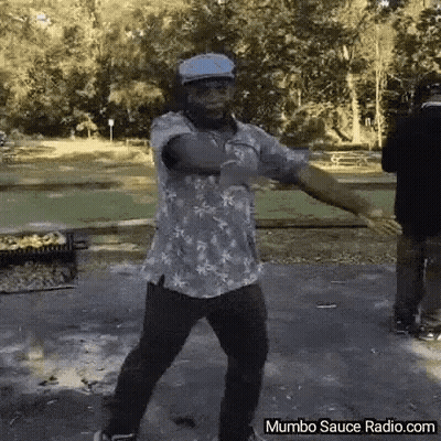 Man in Hawaiian Shirt Dancing at Mumbo Sauce Radio