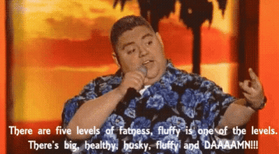 Man In Hawaiian Shirt Giving Middle Finger Holding Microphone GIF