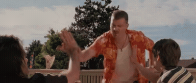 Man In Hawaiian Shirt High-Fiving Group GIF