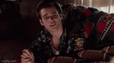 Man In Hawaiian Shirt Holding Guitar On Couch GIF