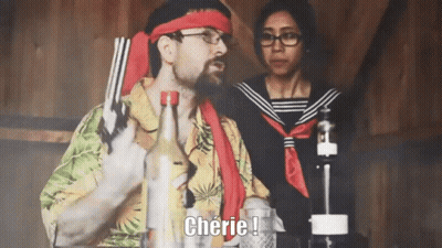 Man In Hawaiian Shirt Holding Gun Says Cherie GIF