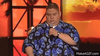 Man In Hawaiian Shirt Holding Microphone Saying Damn GIF