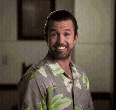 Man In Hawaiian Shirt Smiling At Camera GIF