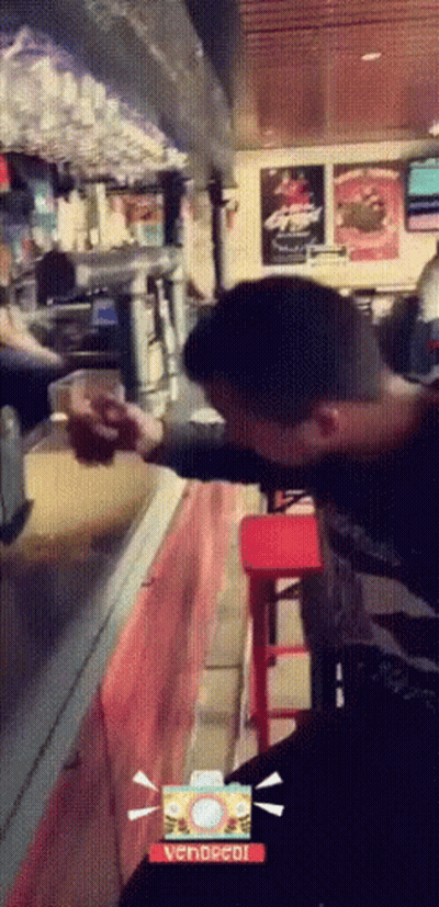 Man In Headband And Blue Shirt Laying Down GIF