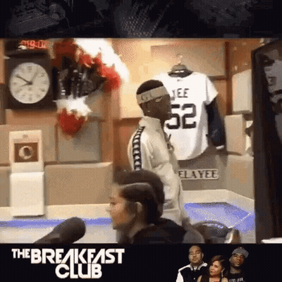Man In Headband And Jersey Number 52 GIF
