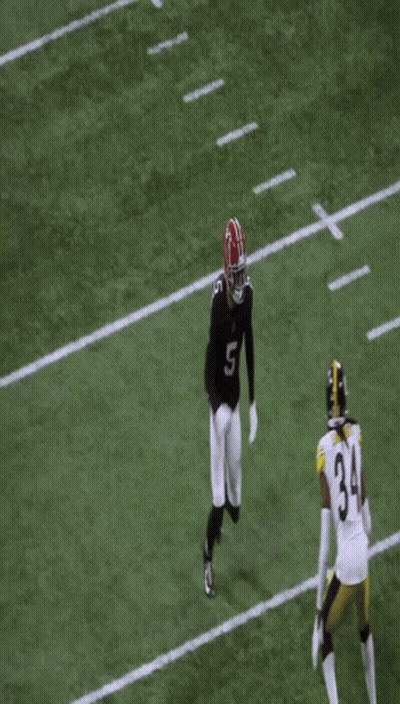 Man In Headband And Jersey Smiling At Game GIF