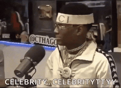 Man In Headband And Sunglasses Talking Into Microphone GIF