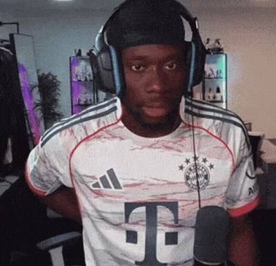 Man In Headphones And Adidas Shirt With Letter T GIF