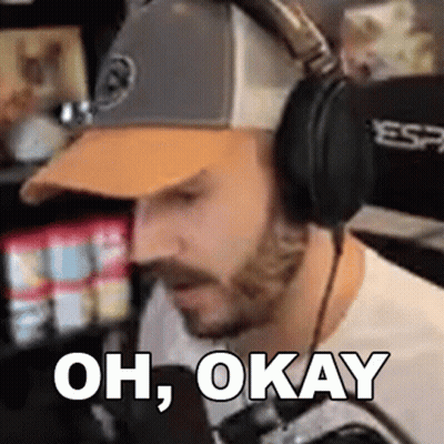Man In Headphones And Baseball Cap Saying Oh Okay GIF