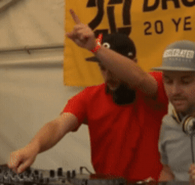 Man In Headphones And Black Hoodie Making Face GIF