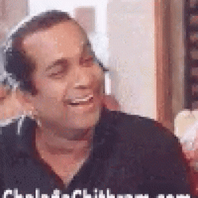 Man In Headphones And Black Shirt Smiling And Laughing GIF