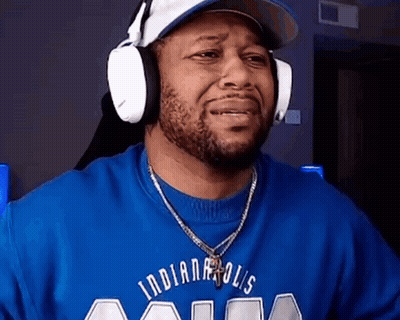 Man In Headphones And Blue Indianapolis Shirt GIF