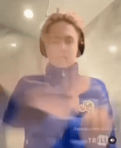Man In Headphones And Blue Jacket Standing GIF