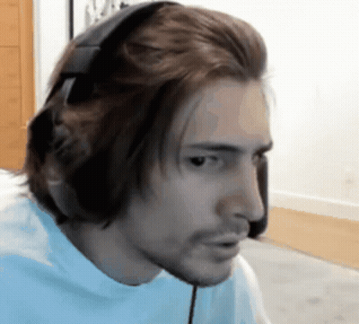 Man In Headphones And Blue Shirt At Computer GIF