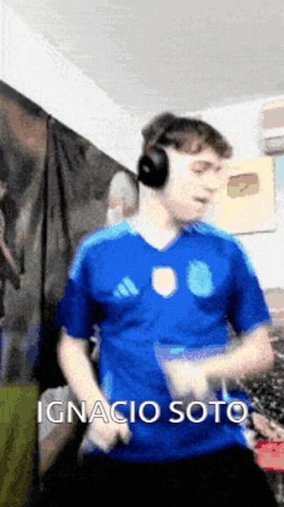 Man In Headphones And Blue Shirt Ignacio Soto GIF