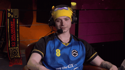 Man In Headphones And Blue Shirt Saying Eee GIF