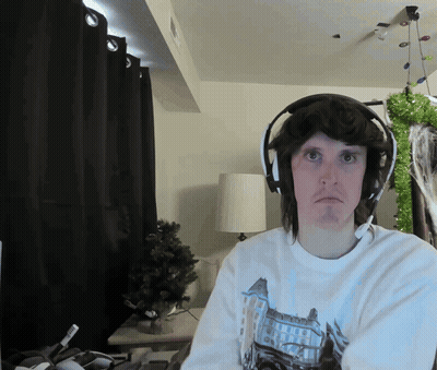 Man In Headphones And Castle Shirt GIF