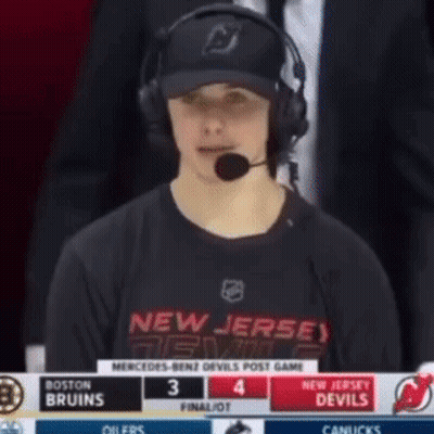 Man In Headphones And Devils Jersey GIF