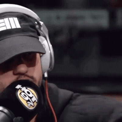 Man In Headphones And Hat Saying E11 Into Microphone GIF