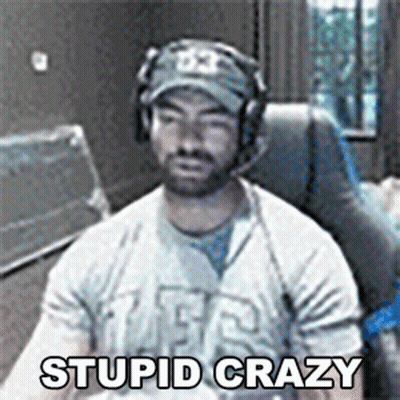 Man in Headphones and Hat Saying Stupid Crazy