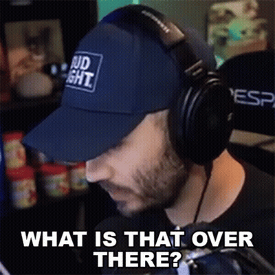Man In Headphones And Hat Saying What Is That Over There GIF