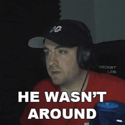 Man In Headphones And Hat Says He Wasn't Around GIF