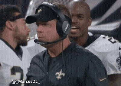 Man In Headphones And Hat With Football Players GIF