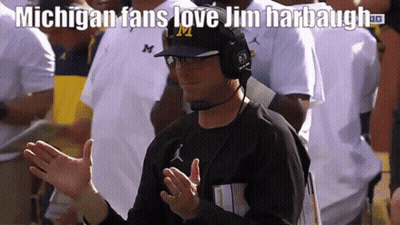 Man In Headphones And Hat With M Says Michigan Fans Love Jim Harbaugh GIF