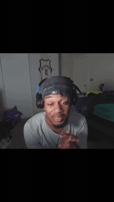 Man In Headphones And Hat With Number 3 GIF