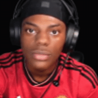 Man In Headphones And Headband Looking At Camera GIF