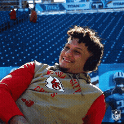 Man In Headphones And Kansas City Chiefs Shirt At Stadium GIF