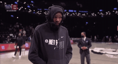 Man In Headphones And Nets Sweatshirt GIF