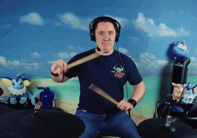 Man In Headphones And Number 10 Shirt Playing Drums GIF