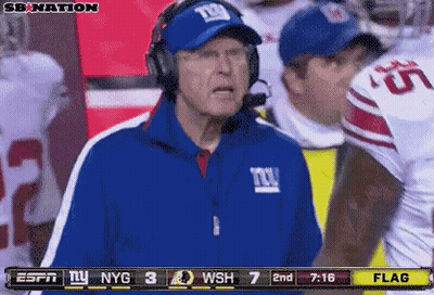 Man In Headphones And NY Giants Jacket Watching ESPN Football GIF
