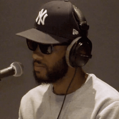 Man In Headphones And NY Hat GIF