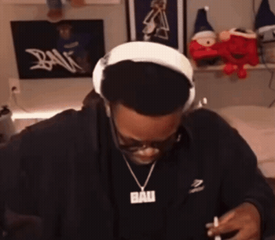 Man In Headphones And Pendant Saying Ban GIF