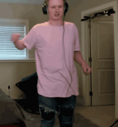 Man In Headphones And Pink Shirt GIF