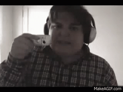 Man In Headphones And Plaid Shirt Taking Selfie GIF