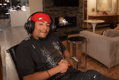 Man In Headphones And Red Hat With Letter R GIF