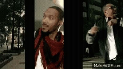 Man In Headphones And Scarf On Sidewalk GIF