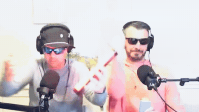 Man In Headphones And Sunglasses Holding Baseball Bat GIF