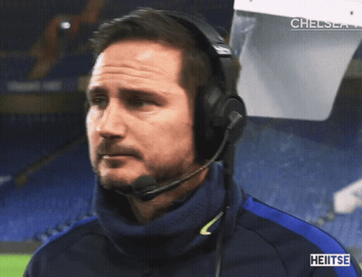 Man In Headphones And Sweatshirt Saying Heitse GIF