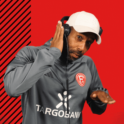 Man in Headphones and Targobank Shirt
