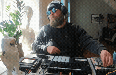 Man In Headphones And Vans Sweatshirt GIF