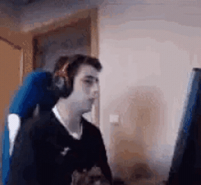 Man In Headphones At Computer GIF