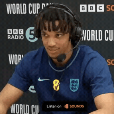Man In Headphones At World Cup GIF