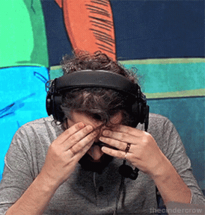 Man In Headphones Covering Eyes With Ring GIF